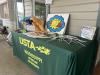 USTA MS table and photo booth at Junior Team Tennis Summer State Championships